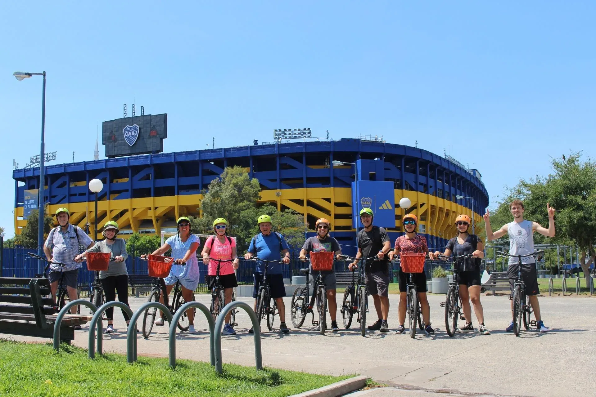 BA Bikes riders with their bicycles outside La Bombonera in La Boca, Buenos Aires.